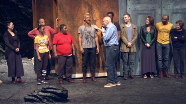Photo of the cast of The Oresteia and Director Michael Kahn in rehearsal. Photo