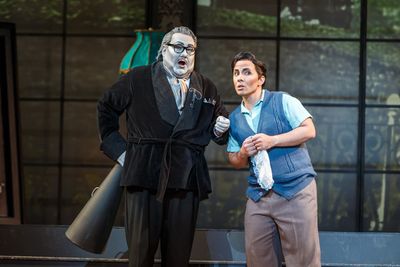 Don Pasquale (Kevin Glavin) prepares to tell his nephew Ernesto (Javier Abreu) a secr Photo