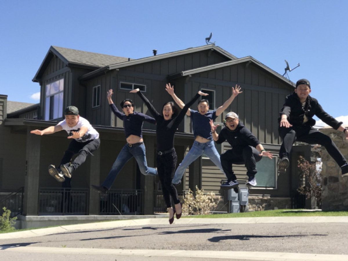 Daniel May, Eric Elizaga, Lia Chang, Joseph Steven Yang, Viet Vo and Kiet Tai Cao. Photo by Eric Bondoc jump for joy in front of company housing at 