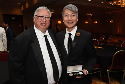 Gold Mountain creator Jason Ma was presented with one of only five sets of commemorat Photo
