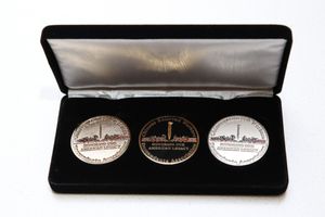 Gold Mountain creator Jason Ma was presented with one of only five sets of commemorat Photo