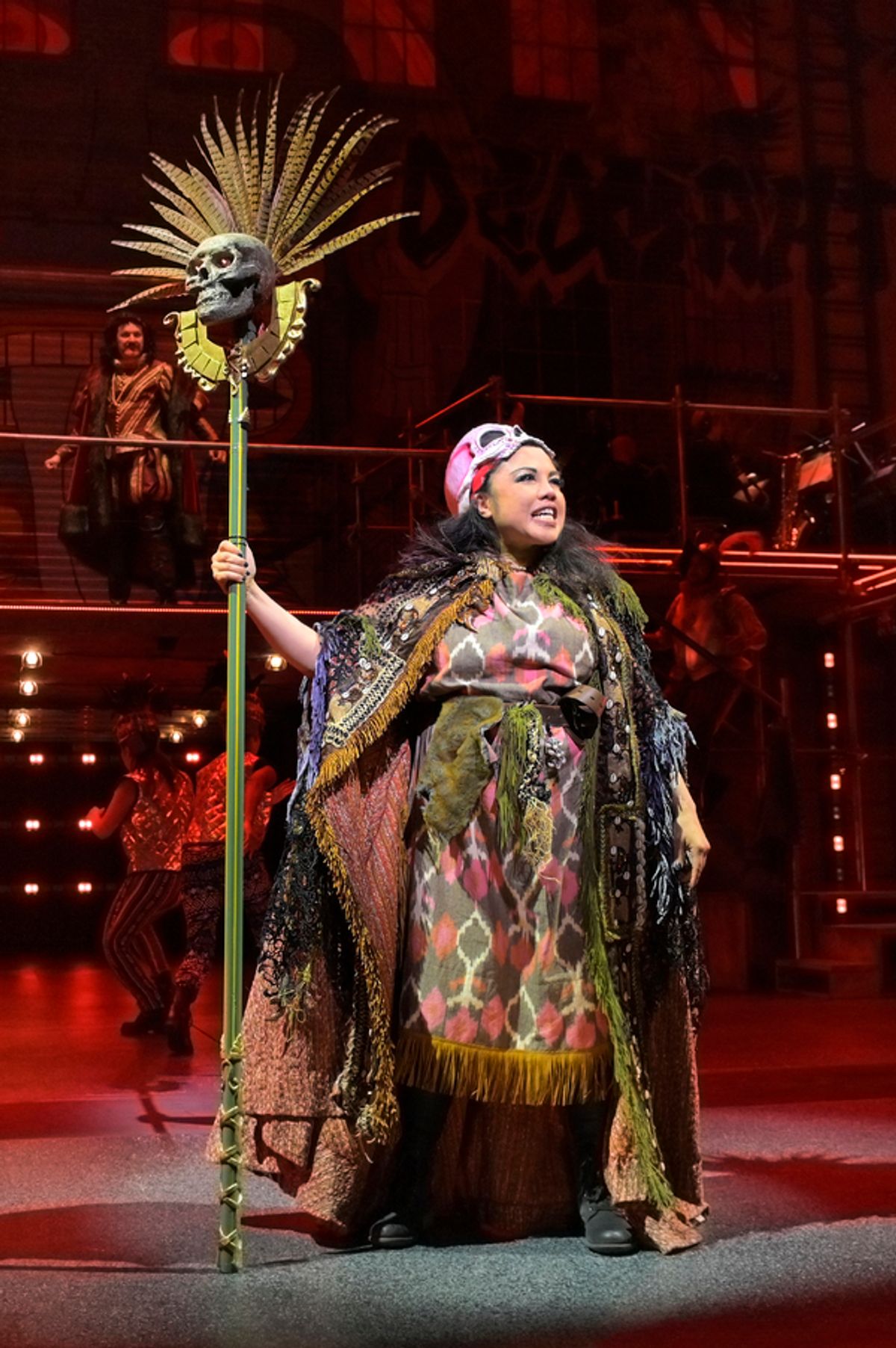 (front) Maria-Christina Oliveras (Tolima); (background) Al Rodrigo (Rodrigo) in the world premiere of Kiss My Aztec! at Berkeley Rep, directed by Tony Taccone.

 at 