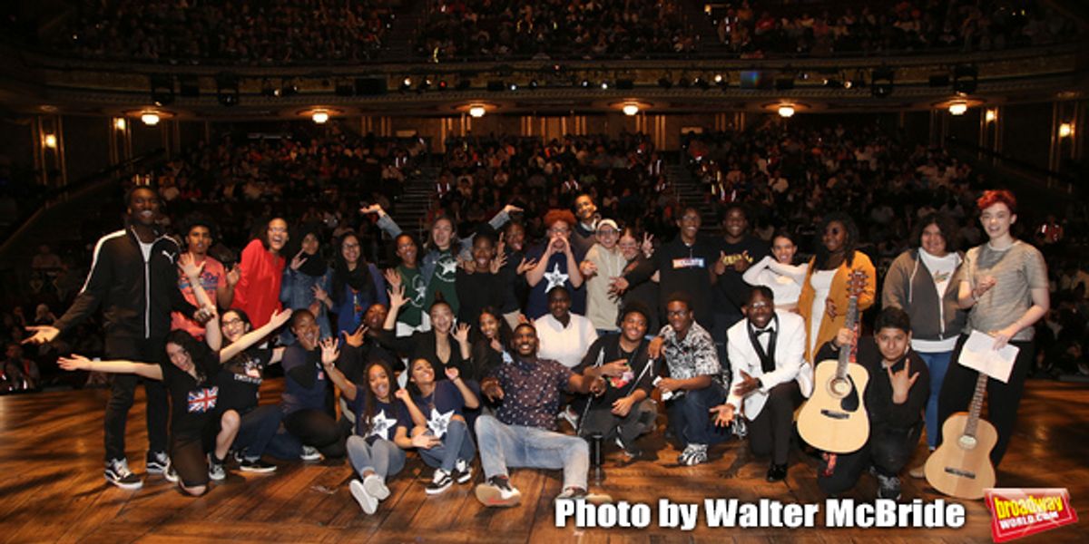 Carvens Lissaint with High School student performers at 