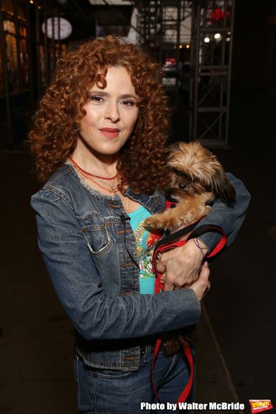 Bernadette Peters with a dog from The Humane Society of New York Photo