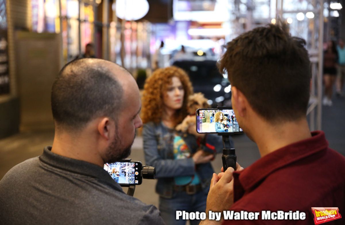 Bernadette Peters with a dog from The Humane Society of New York at 