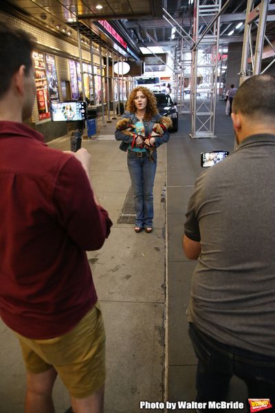 Bernadette Peters with dogs from The Humane Society of New York Photo