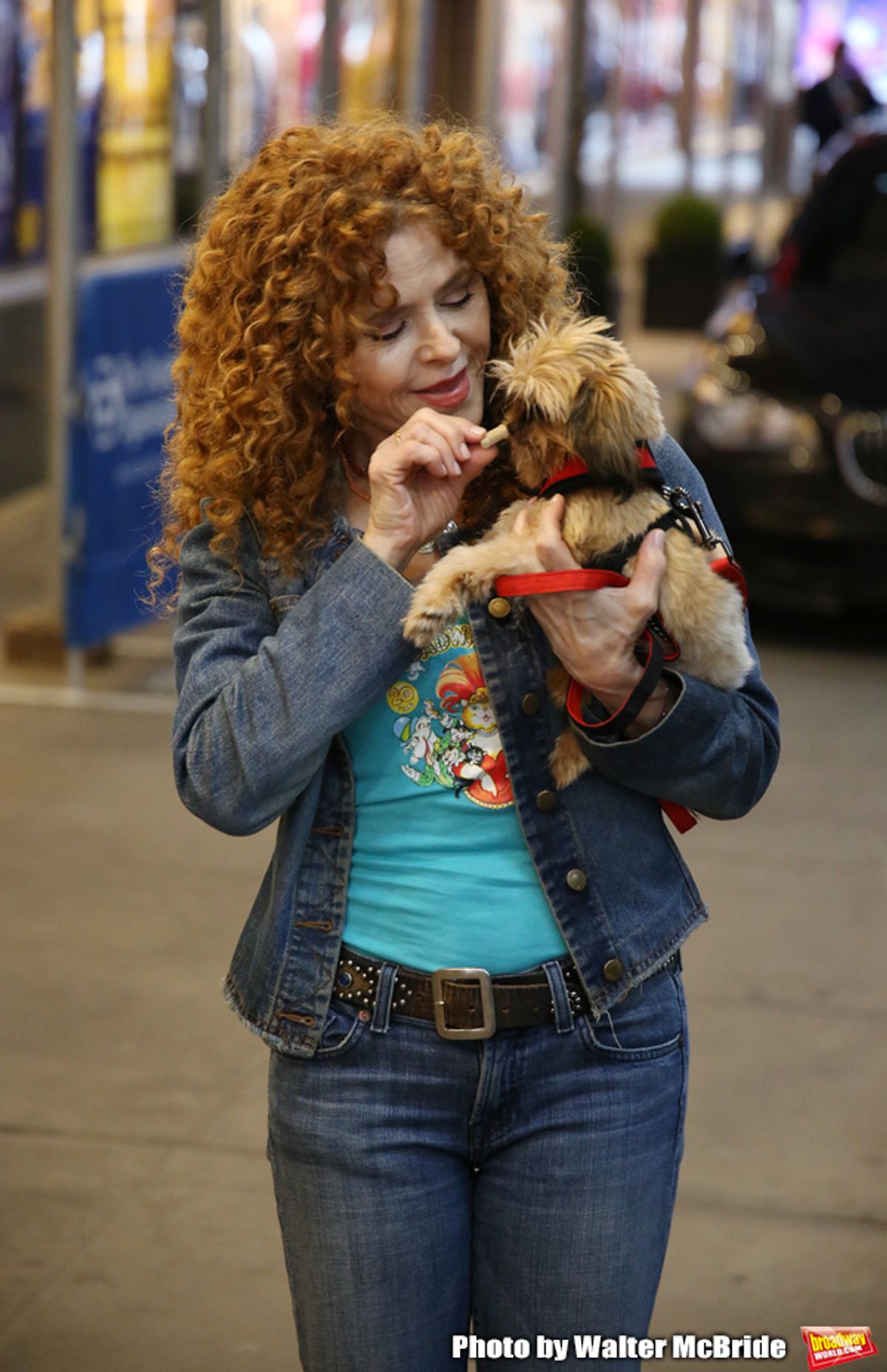 Bernadette Peters with a dog from The Humane Society of New York at 