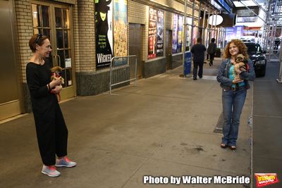 Laurie Metcalf and Bernadette Peters with dogs from The Humane Society of New York Photo