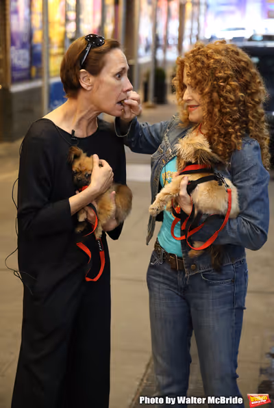 Laurie Metcalf and Bernadette Peters with dogs from The Humane Society of New York Photo