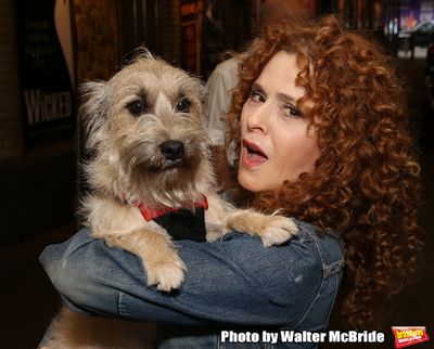 Bernadette Peters with a dog from The Humane Society of New York Photo