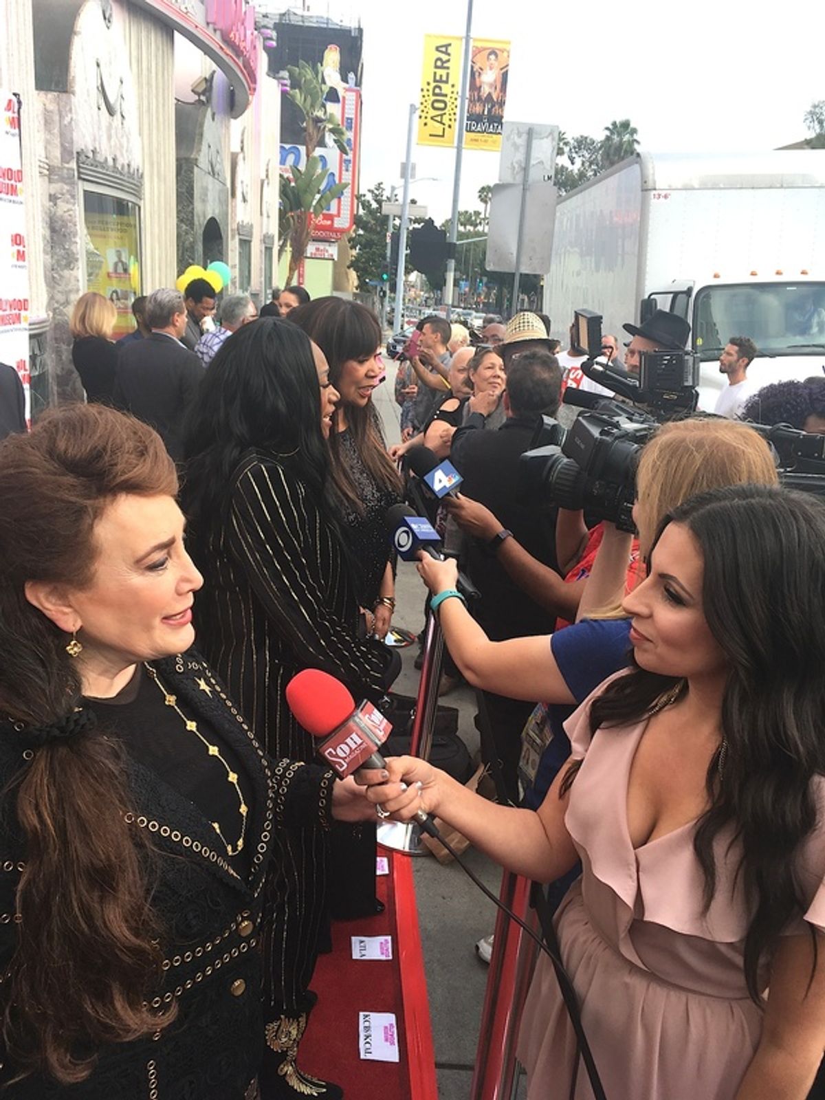 Donelle Dadigan and Pointer Sisters doing interviews on the red carpet at 