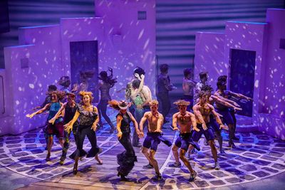 Lucy May Barker, Cameron Burt, and the cast of MAMMA MIA! Photo