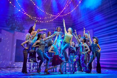 Lucy May Barker and the cast of MAMMA MIA!  Photo