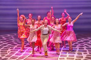 Melissa Nettleford, Lucy May Barker, Sophie Matthew, and the cast of MAMMA MIA! Photo