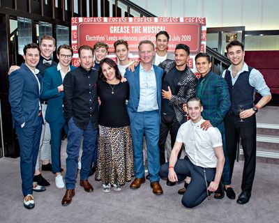 Peter Andre and the male cast of Grease, with Nikolai Foster, Arlene Philips, and Col Photo