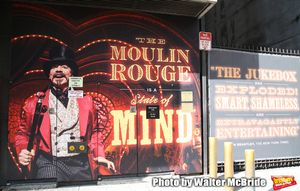 Billboard of Danny Burstein for "Moulin Rouge!"  Photo