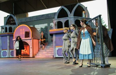 Claire Wilkinson (Bell), the Beast (Bret Olson) and ensemble. Photo