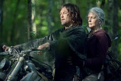 Norman Reedus as Daryl Dixon, Melissa McBride as Carol Peletier  Photo