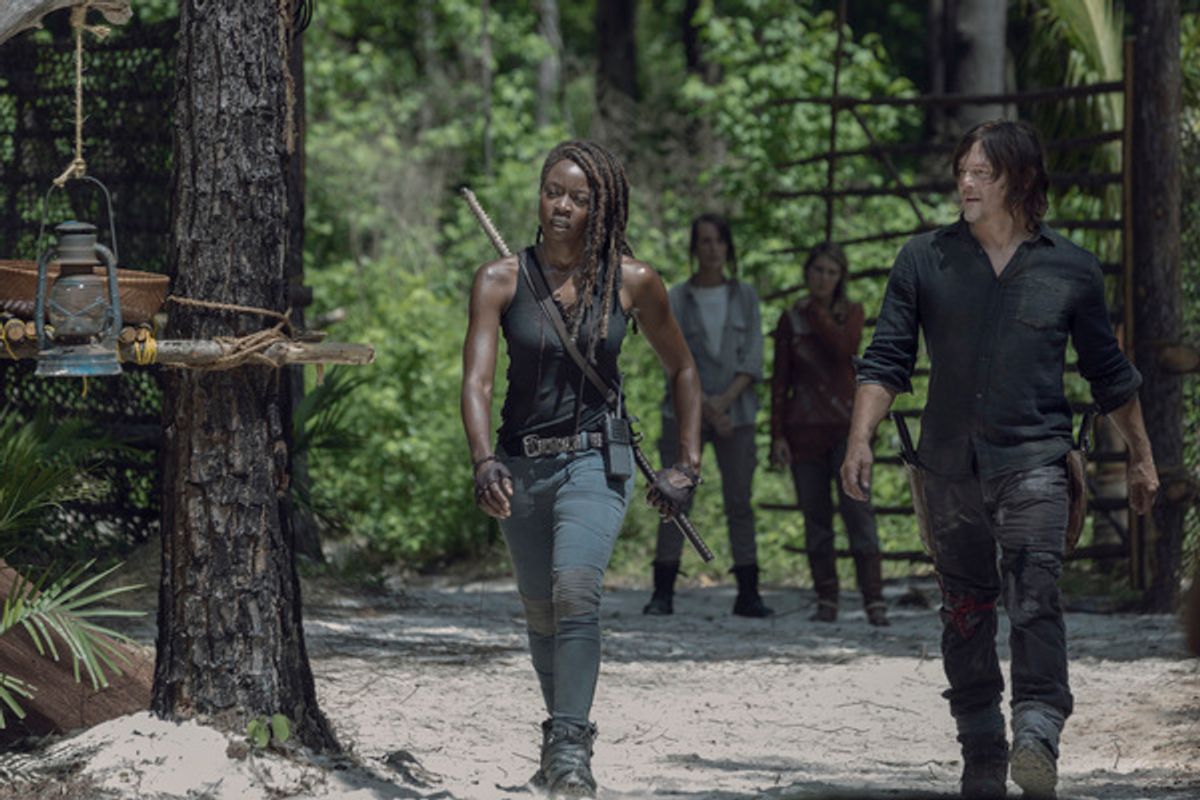 Danai Gurira as Michonne, Norman Reedus as Daryl Dixon  at 