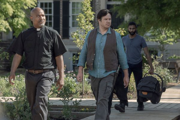 Seth Gilliam as Father Gabriel Stokes, Josh McDermitt as Dr. Eugene Porter, Avi Nash  Photo