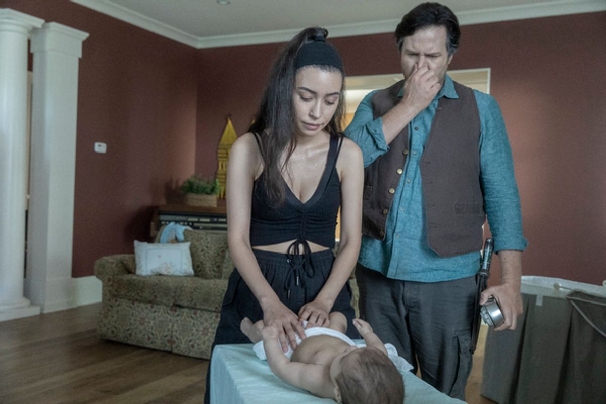 Christian Serratos as Rosita Espinosa, Josh McDermitt as Dr. Eugene Porter, Baby Coco at 