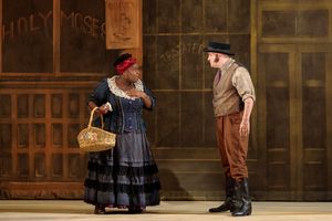 Judith Skinner as Queenie and Spencer Hamlin as Pete in The Glimmerglass Festival’s 2019 production of "Show Boat." Photo Credit: Connor Lange/The Glimmerglass Festival @ BroadwayWorld Judith Skinner as Queenie and Spencer Hamlin as Pete in The Glimmerglass Festival⿠Photo