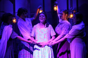 Ashton Botts as Alice Murphy with female ensemble  Photo