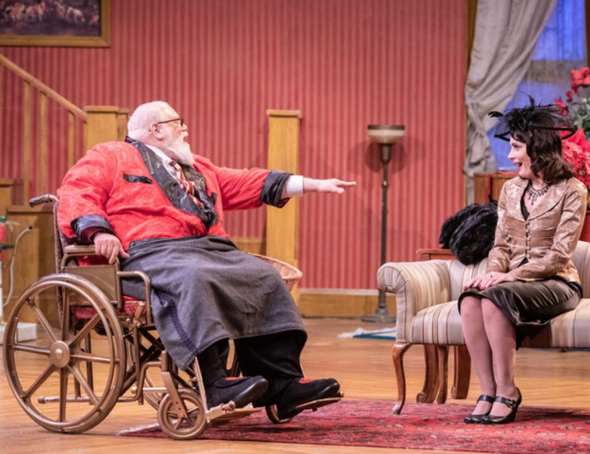 Edward Fernandez as Sheridan Whiteside and Lynne DeMers-Hunt as Lorraine Sheldon. at 