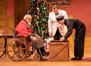 Edward Fernandez as Sheridan Whiteside, Preston Schreffler as John, and Rogan Motter  Photo