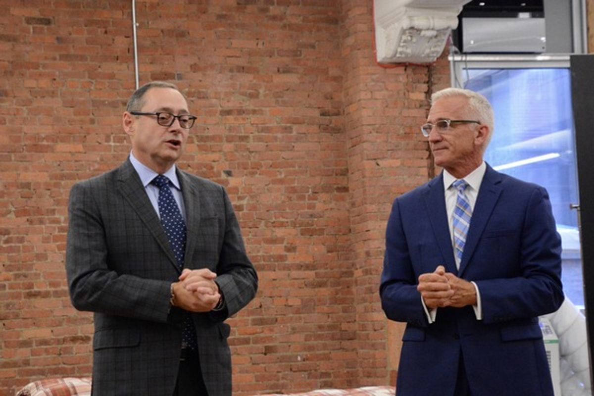 Michael Stotts and Mark S. Hoebee at 