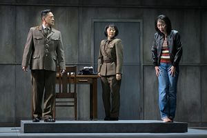  Paul Juhn (Official), Cindy Im (Soldier Two), and Jo Mei (Hanako) in the American pr Photo