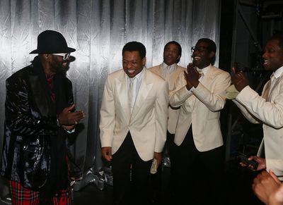 Otis Williams chats with Derrick Baskin  Photo