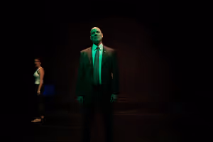 Don Carter as Ex-Congressman Hank Flynn in The Regime is Female at the Tank, November Photo