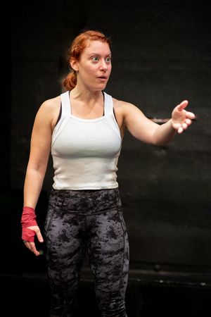 Sarah Elizabeth Grace as River Flynn in The Regime is Female at the Tank, November 1  Photo
