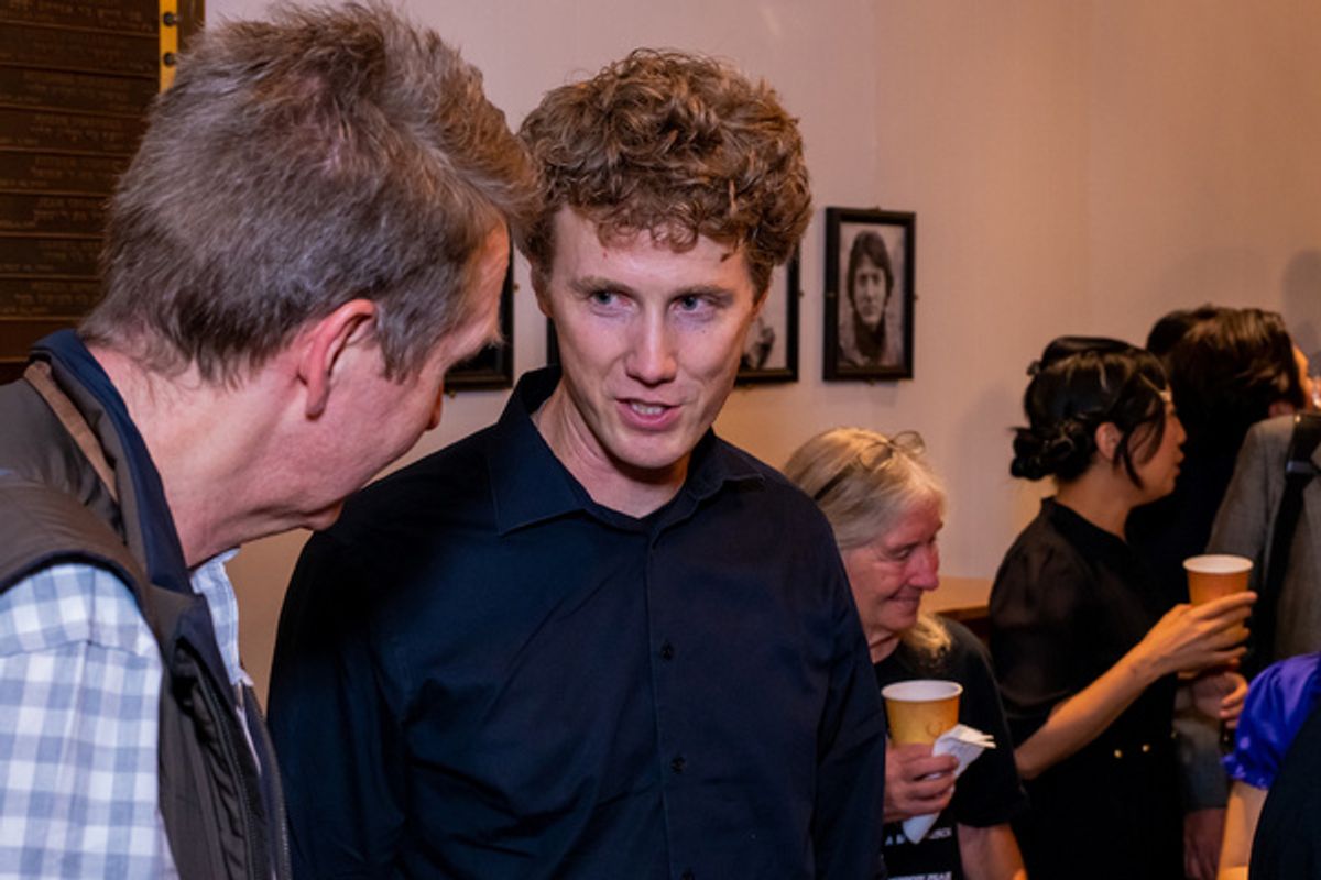 Jonathan Fadner (Composer/Writer) speaks with a guest. (Dusty Rhoades)   at 