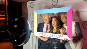 Yoel Haller, Dominique Dauster, Monica Yunus, and Muhammad Yunus Photo