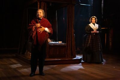 David Rainey as Scrooge and David Matranga as Mrs. Dilber Photo