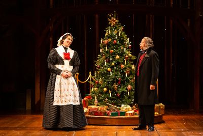  David Matranga as Mrs. Dilber and David Rainey as Scrooge Photo