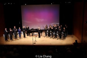 Conductor Susanne Sheston is flanked on her right by tenor Joshua Dennis, bass Adrian Photo
