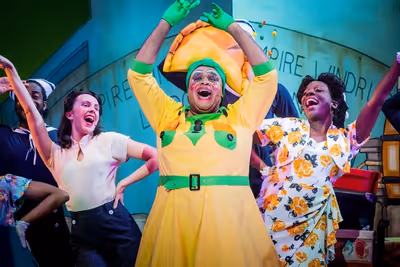 Clive Rowe and cast Photo