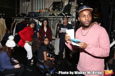 Deon'te Goodman with student performers Photo