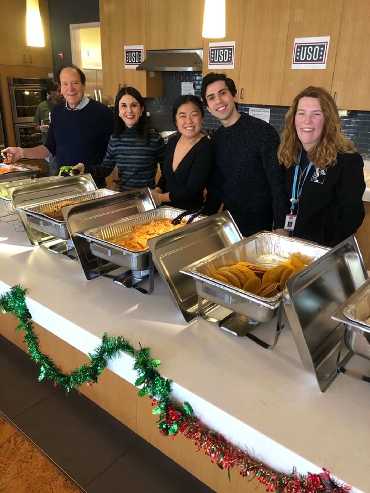 Photo Flash: Cast of Arena Stage's NEWSIES and Ken Ludwig Volunteered at the United Service Organization  Image