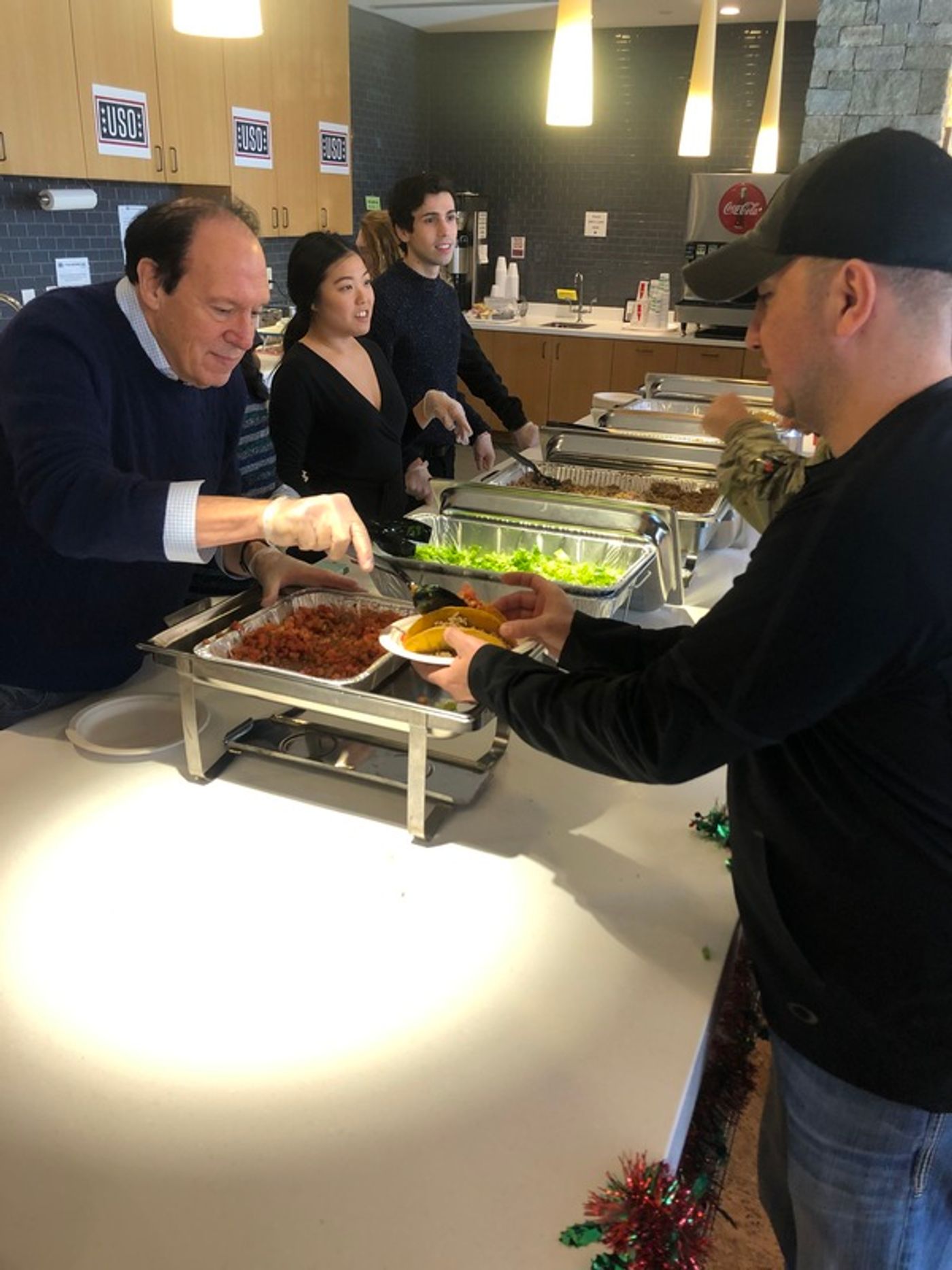 Photo Flash: Cast of Arena Stage's NEWSIES and Ken Ludwig Volunteered at the United Service Organization  Image