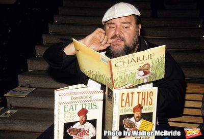 Dom DeLuise signs copies of his children's book, "Charlie the Catepillar" and his fir Photo