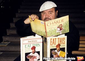 Dom DeLuise signs copies of his children's book, "Charlie the Catepillar" and his fir Photo
