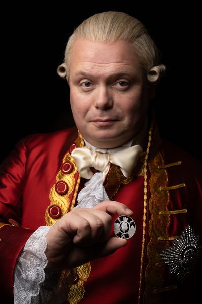 Gavin Spokes with The Royal Mint’s new £5 commemorative coin  Photo