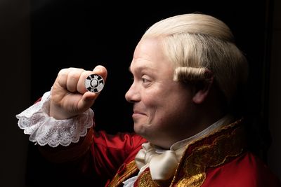 Gavin Spokes with The Royal Mint’s new £5 commemorative coin  Photo