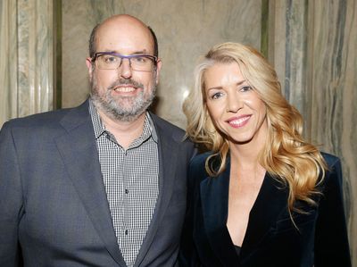 NEW YORK, NEW YORK - JANUARY 30: Christopher Ashley and Kelly Devine pose at a Meet & Photo