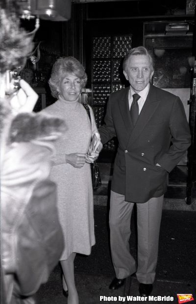 Kirk Douglas and his wife Ann Burdens having dinner at Elaines after attending a Broa Photo