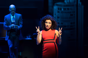 Sydney Morton plays rising corporate exec Christy Lockhart and Jeremy Peter Johnson ( Photo